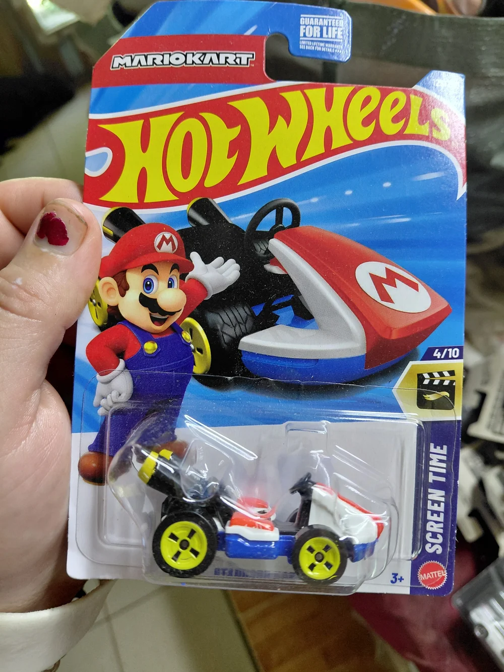 the Hot Wheels Mario Kart Standard Kart featuring Mario, part of the HW Screen T